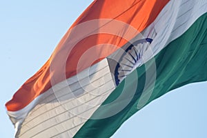 India flag flying high at Connaught Place with pride in blue sky, India flag fluttering, Indian Flag on Independence Day and photo