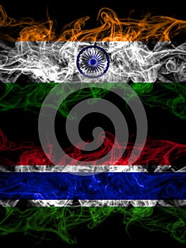 India, Indian vs Gambia, Gambian smoky mystic flags placed side by side. Thick colored silky abstract smoke flags