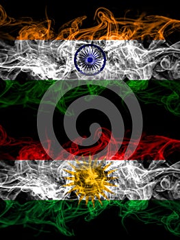 India, Indian vs Kurdistan, Kurdish, Kurds smoky mystic flags placed side by side. Thick colored silky abstract smoke flags