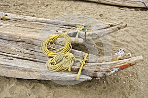 India, Puducherry, wooden handmade crude boats on sand