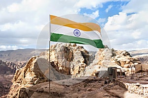 India symbol indian flag against mountains, blue sky