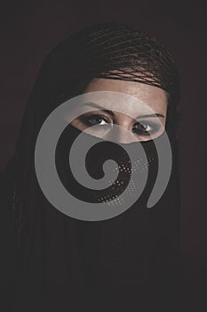 India, woman in traditional Islamic veil, burka, beautiful and d
