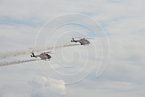 Indian Air Force SARANG aerobatic team on ALH multi-purpose helicopters in the sky of the MAKS-2021 International Aviation and Spa