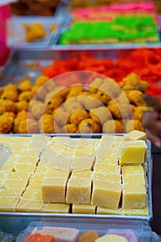 Indian assorted sweets or mithai for sale during Deepavali or Diwali festival at the market.