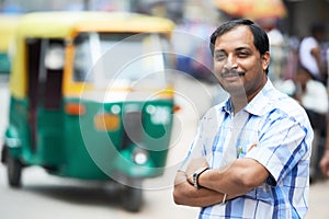 Indian auto rickshaw tut-tuk driver man