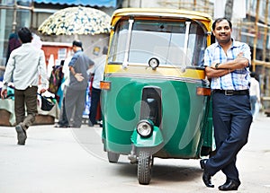 Indian auto rickshaw tut-tuk driver man