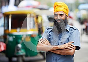 Indian auto rickshaw tut-tuk driver man