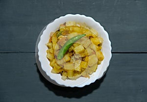 Indian Bengali Food Puri or Luchi with Aloo Sabji . Indian Poori is a bread deep fried in refined oil.