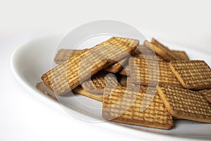 indian biscuits wheat biscuits in the plate white background