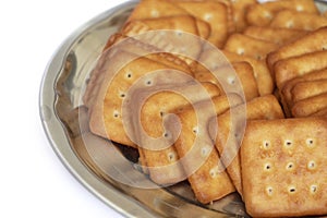 indian biscuits wheat biscuits in the plate white background