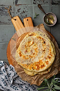 Indian bread Naan with cheese and garlic