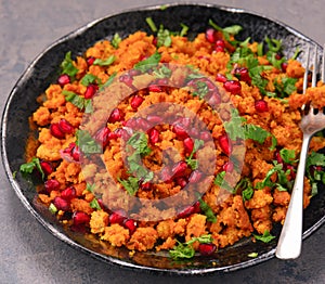 Indian breakfast - spicy dalia couscous photo