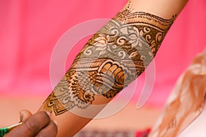 Indian bridal hand with mehandi design