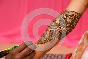 Indian bridal hand with mehandi design