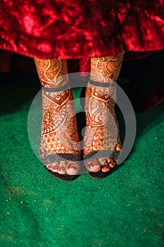 Indian bride closeup capture of wedding reception shoes