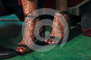Indian bride closeup capture of wedding reception shoes