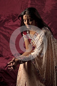 Indian bride with jewels and saree
