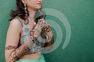 Indian bride showing hand mehndi design