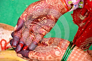 Indian bride showing hands mehndi design