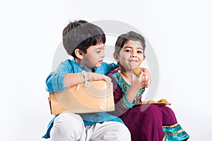 Indian brother and sister celebrating rakshabandhan or rakhi festival