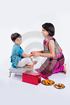 Indian brother and sister celebrating rakshabandhan or rakhi festival