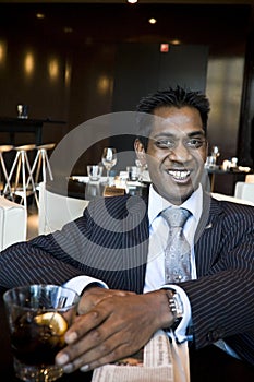 Indian Business Man Sitting In Restaurant