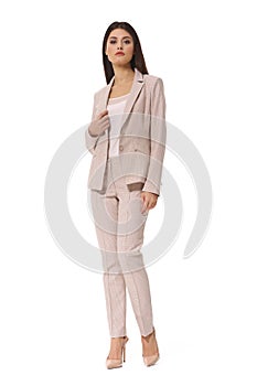Indian business woman in beige pant suit full body protrait in h