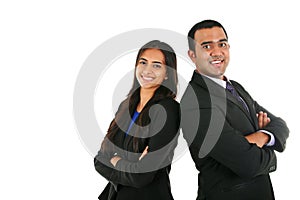 Indian businessman and businesswoman in group standing with folded hands