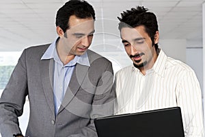 Indian Businessman with laptop.