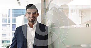 Indian businessman smile looking at camera posing in office