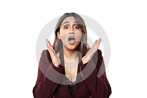 Indian businesswoman with shock expression, on white