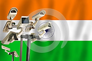 Indian CCTV camera on the flag of India Surveillance, security, control and totalitarianism concept