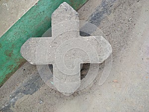 Indian cement concrete made stone crossmark