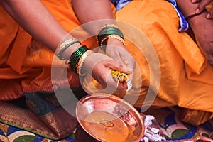 Indian Ceremony With Turmeric Powder