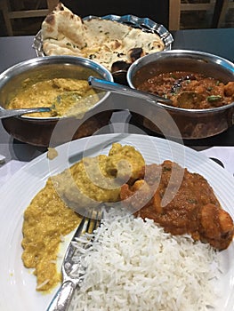 Indian Chicken Korma Curry and Prawn Madras with Naan Bread, U.K