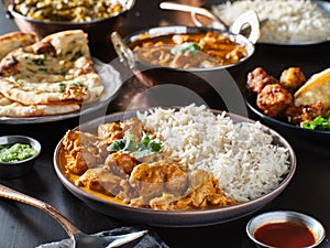 Indian chicken tikka masala on plate with basmati rice