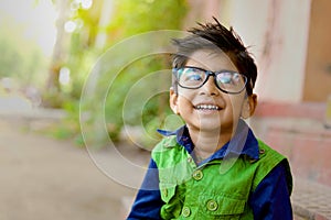 Indian Child wearing eyeglasses photo