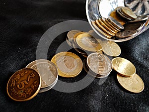 INDIAN COINS IN BLACK BACKGROUND