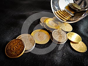 INDIAN COINS IN BLACK BACKGROUND