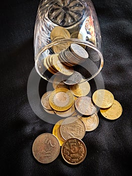 INDIAN COINS IN BLACK BACKGROUND