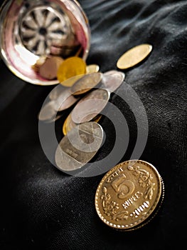 INDIAN COINS IN BLACK BACKGROUND