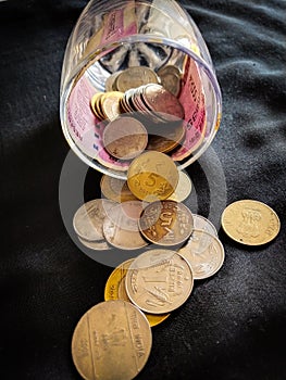 INDIAN COINS IN BLACK BACKGROUND