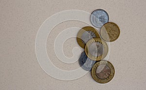 Indian coins with focus on 10 rupee coin on white background. 10, 5 Indian coinage use for financial, economy, investment concept