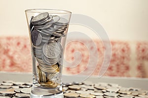 Indian Coins on Glass Table