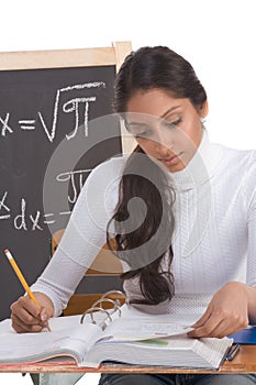 Indian college student woman studying math exam