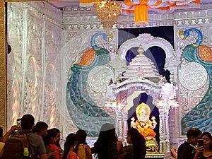 Indian college students enjoying a ganesh festival at india mainly in pune kasaba peth