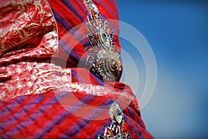 Indian colorful dress with beads and crystals at culture festival market