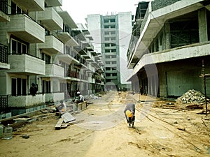 INDIAN CONSTRUCTION SITE WITH WORKING LABOURS