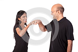 Indian couple bumping fists