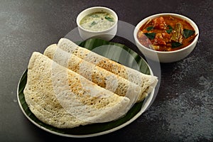 Indian cuisine-  Dosa with sambar and chutney- Vegan  breakfast.
